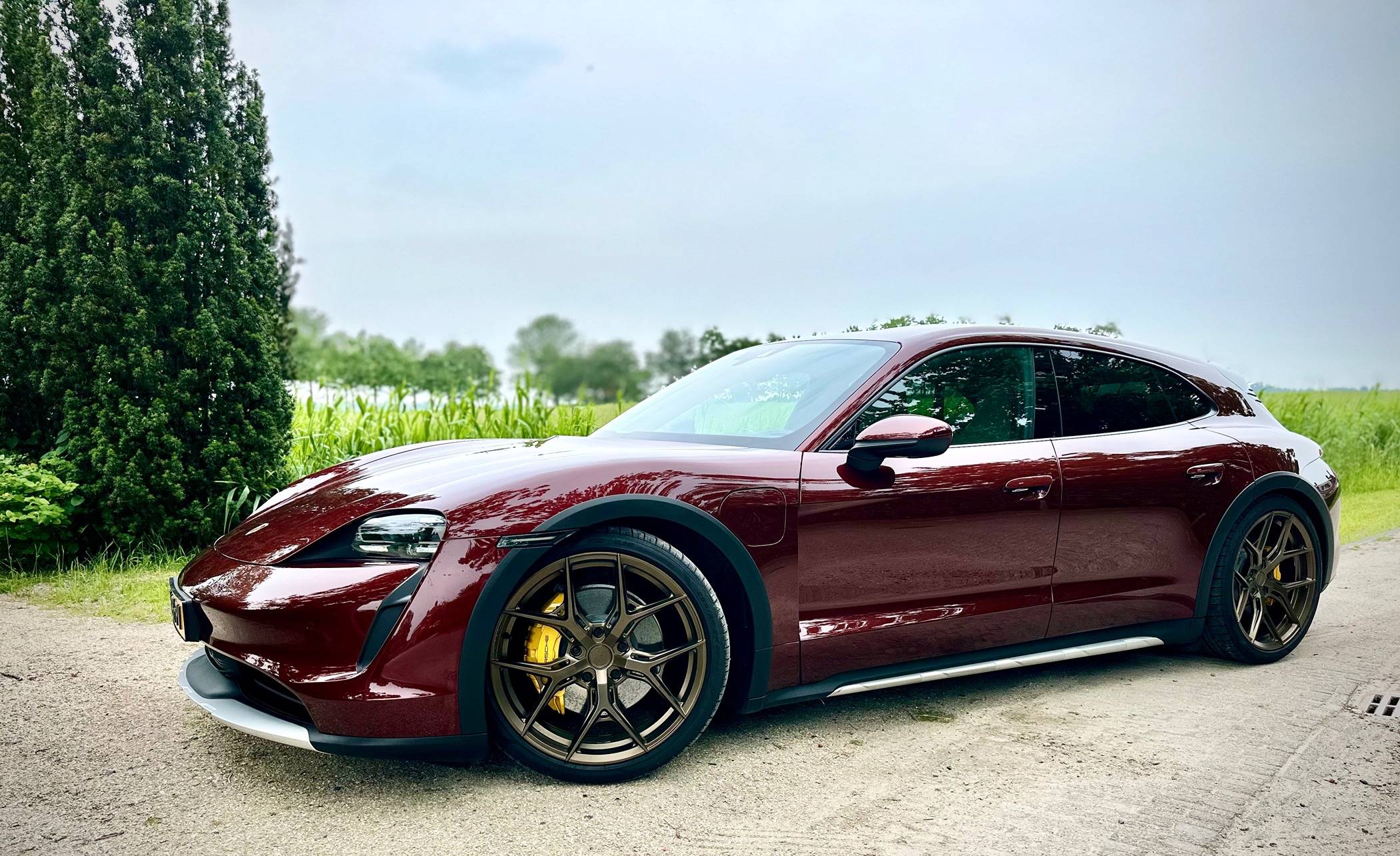 Cherry Red Taycan 4 Cross Turismo + Bronze 21” Vossen HF5 and