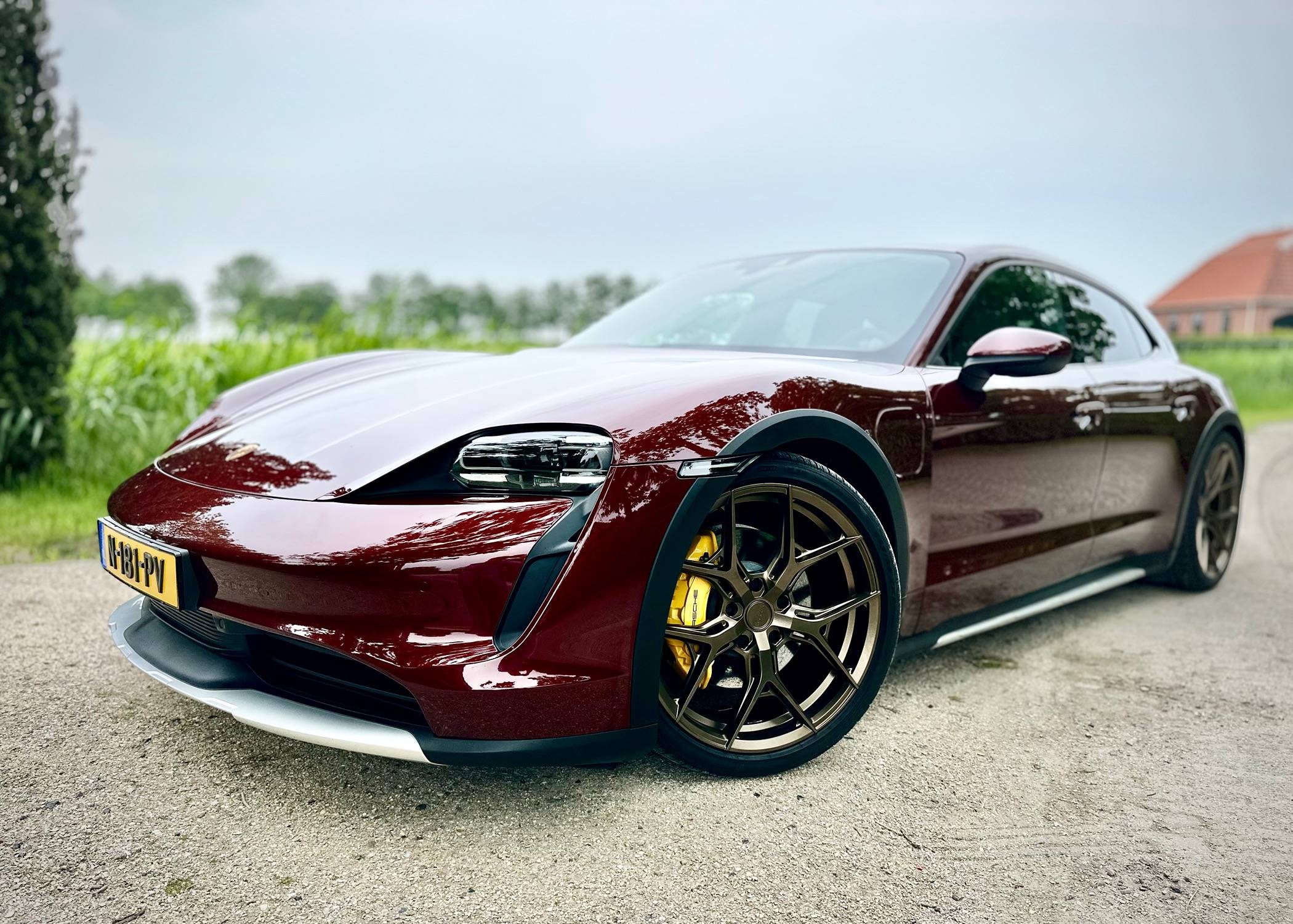 Cherry Red Taycan 4 Cross Turismo + Bronze 21” Vossen HF5 and