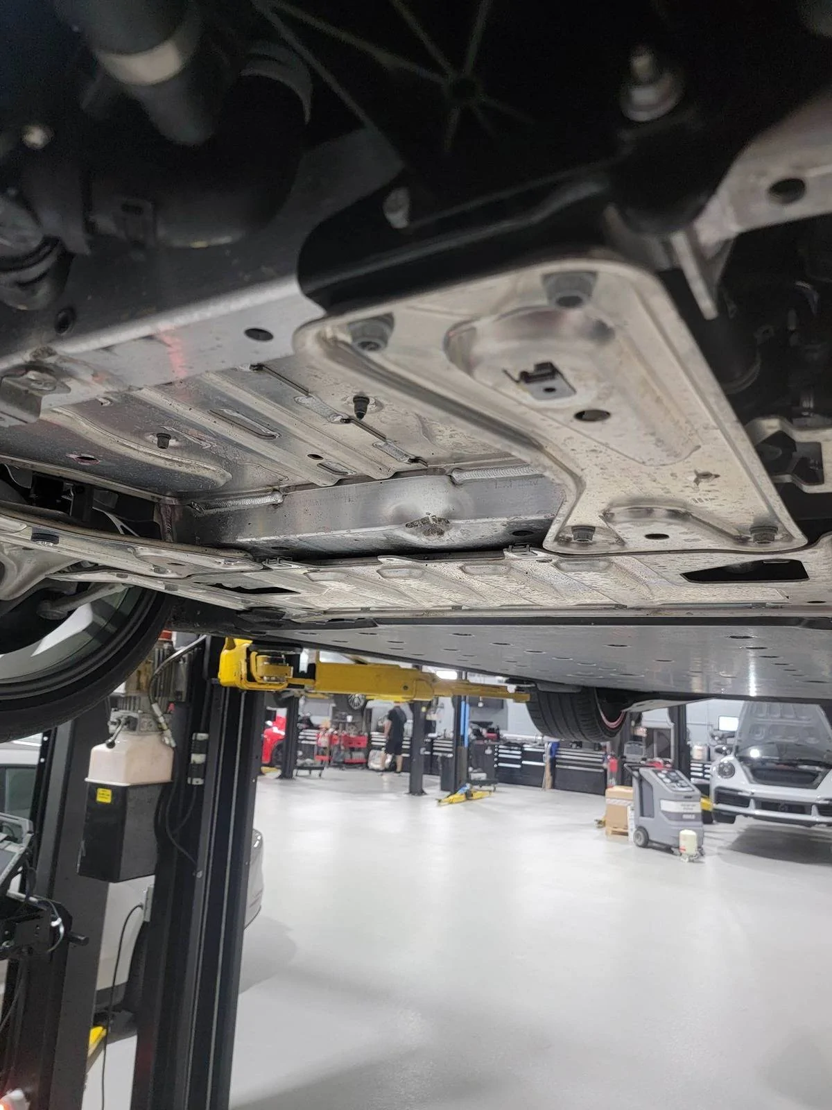 Porsche Taycan Taycan 4S Damaged While in For Recall Work at Dealer trailer-hitch-incident-3