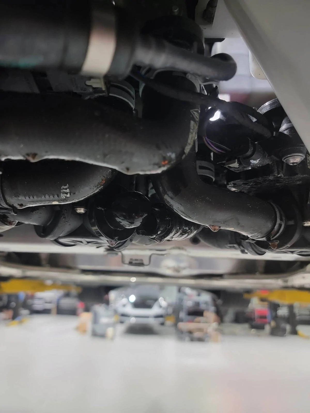 Porsche Taycan Taycan 4S Damaged While in For Recall Work at Dealer trailer-hitch-incident-2
