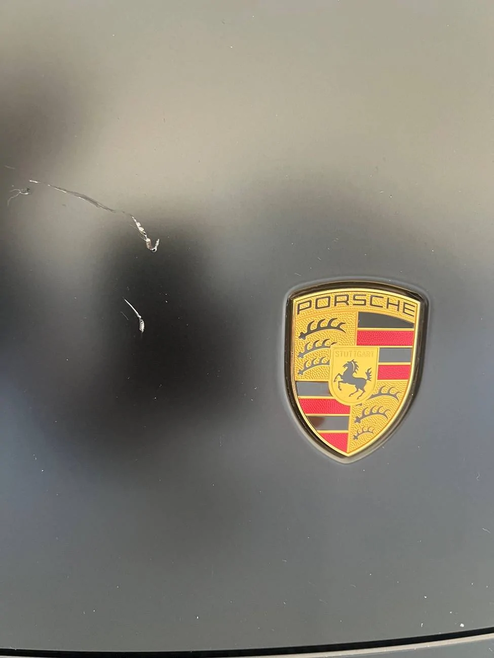Porsche Taycan Took one on the Taycan chin (again) IMG_0448