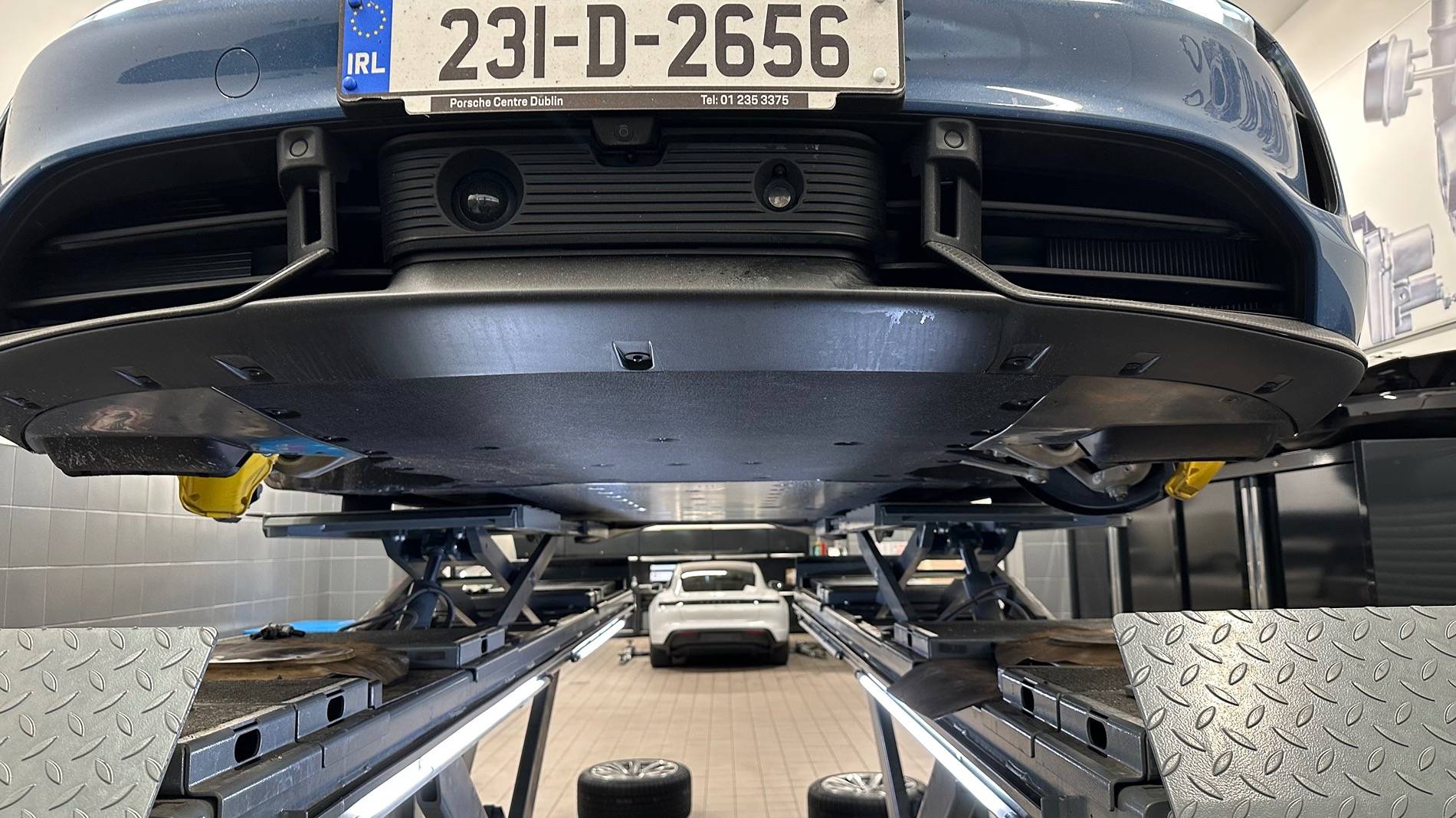 Porsche Taycan Underbody Protection Panel damaged. Batteries and coolant lines need inspection.  $72.5K replacement & labor cost. Dealership is Tom Wood in Indiana IMG_5185