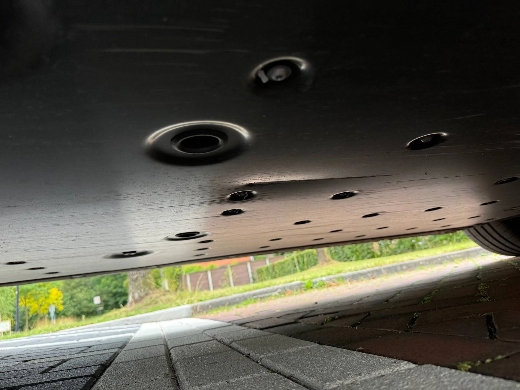 Porsche Taycan Underbody Protection Panel damaged. Batteries and coolant lines need inspection.  $72.5K replacement & labor cost. Dealership is Tom Wood in Indiana IMG_3462