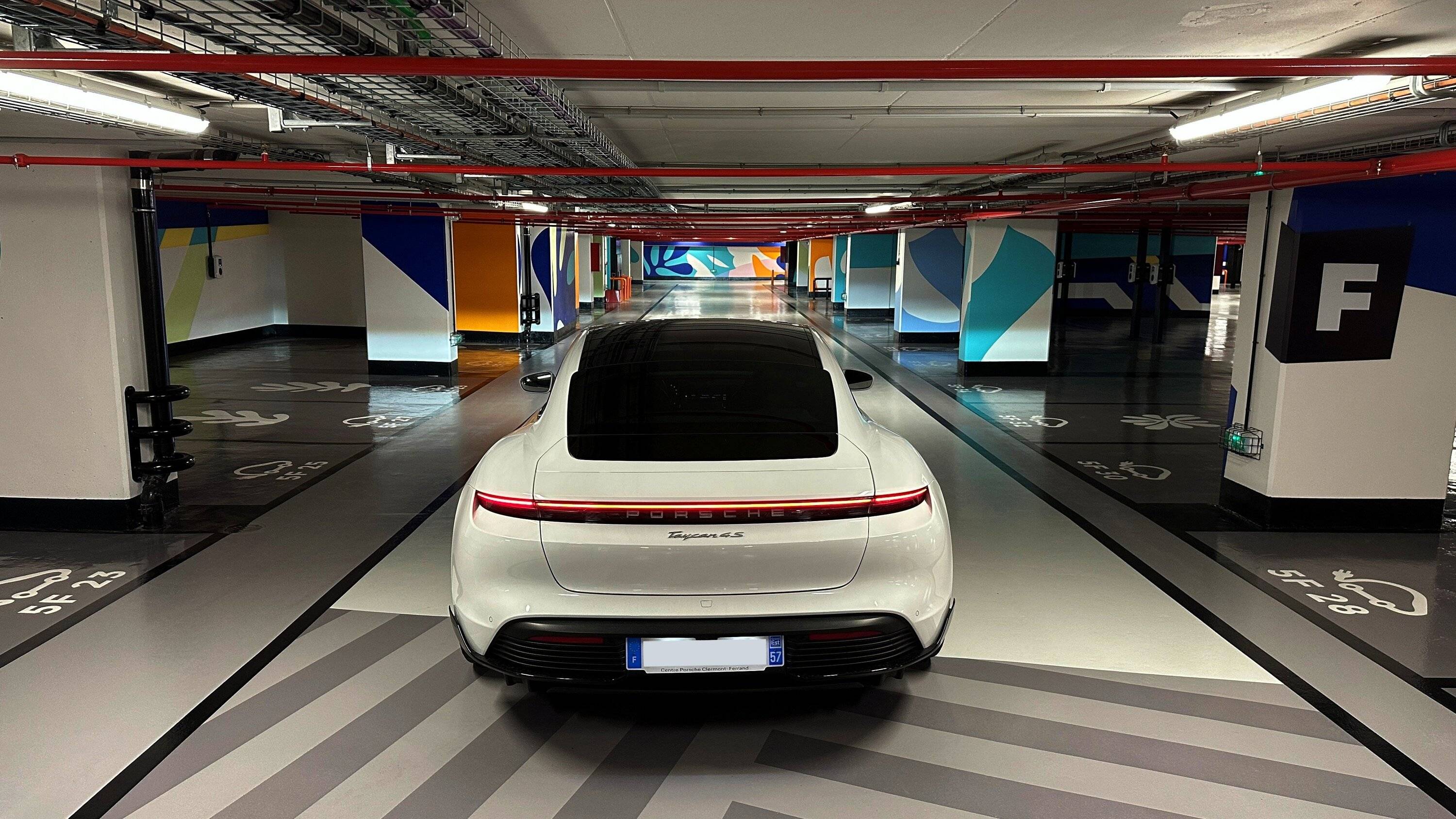 Porsche Taycan 500 EV charging spots in this underground parking IMG_3270.JPG