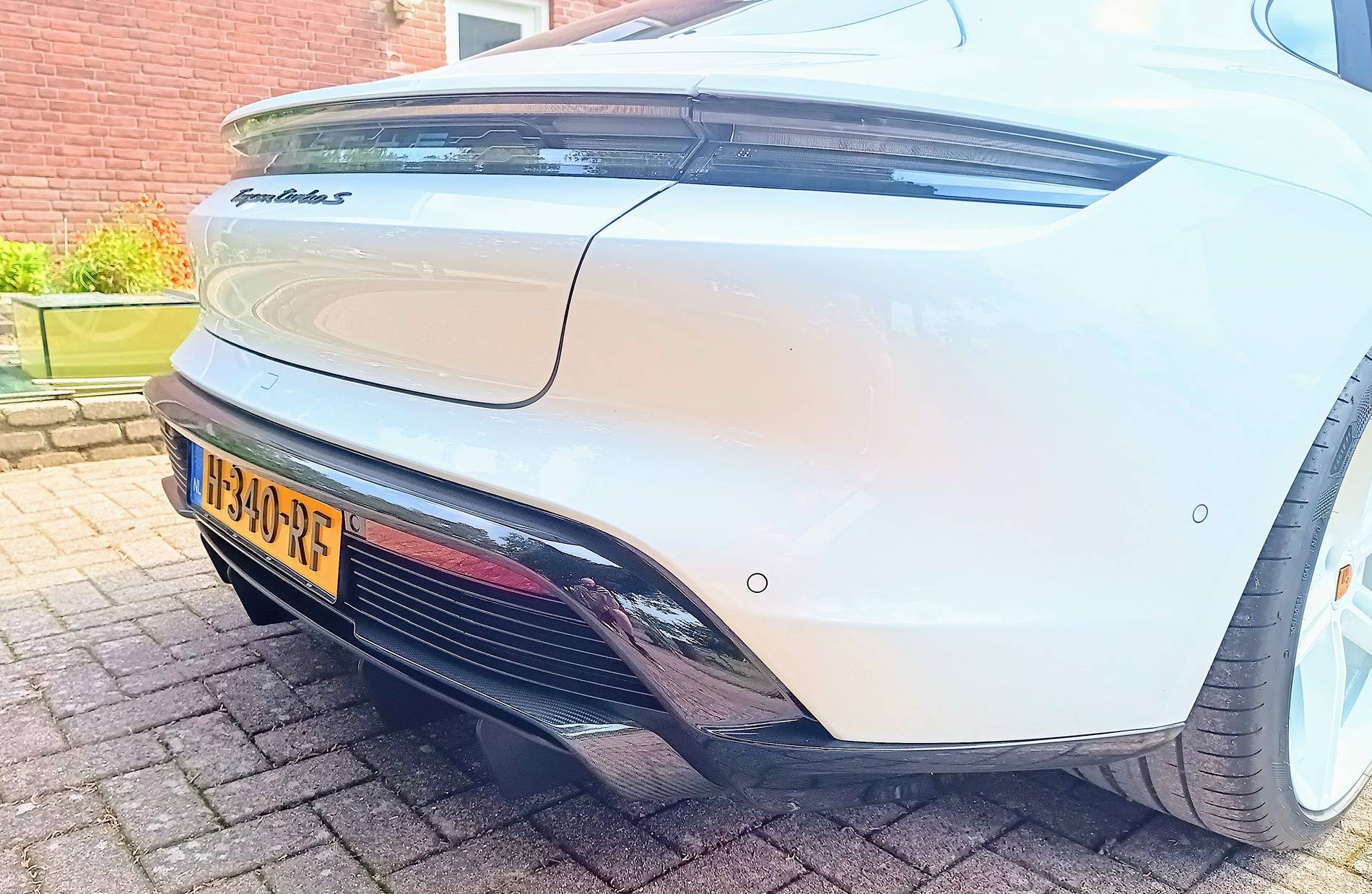 Porsche Taycan I painted my Mission E wheels white. IMG_20240903_125451860_HDR