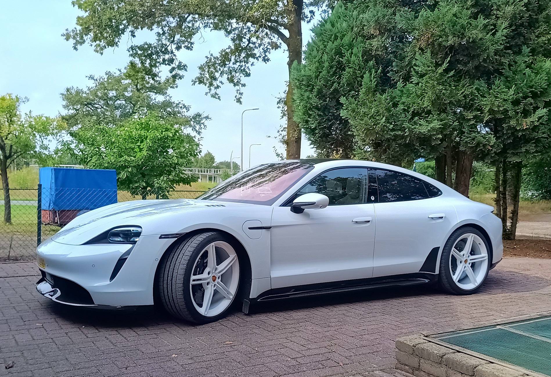 Porsche Taycan I painted my Mission E wheels white. IMG_20240903_125531336_HDR