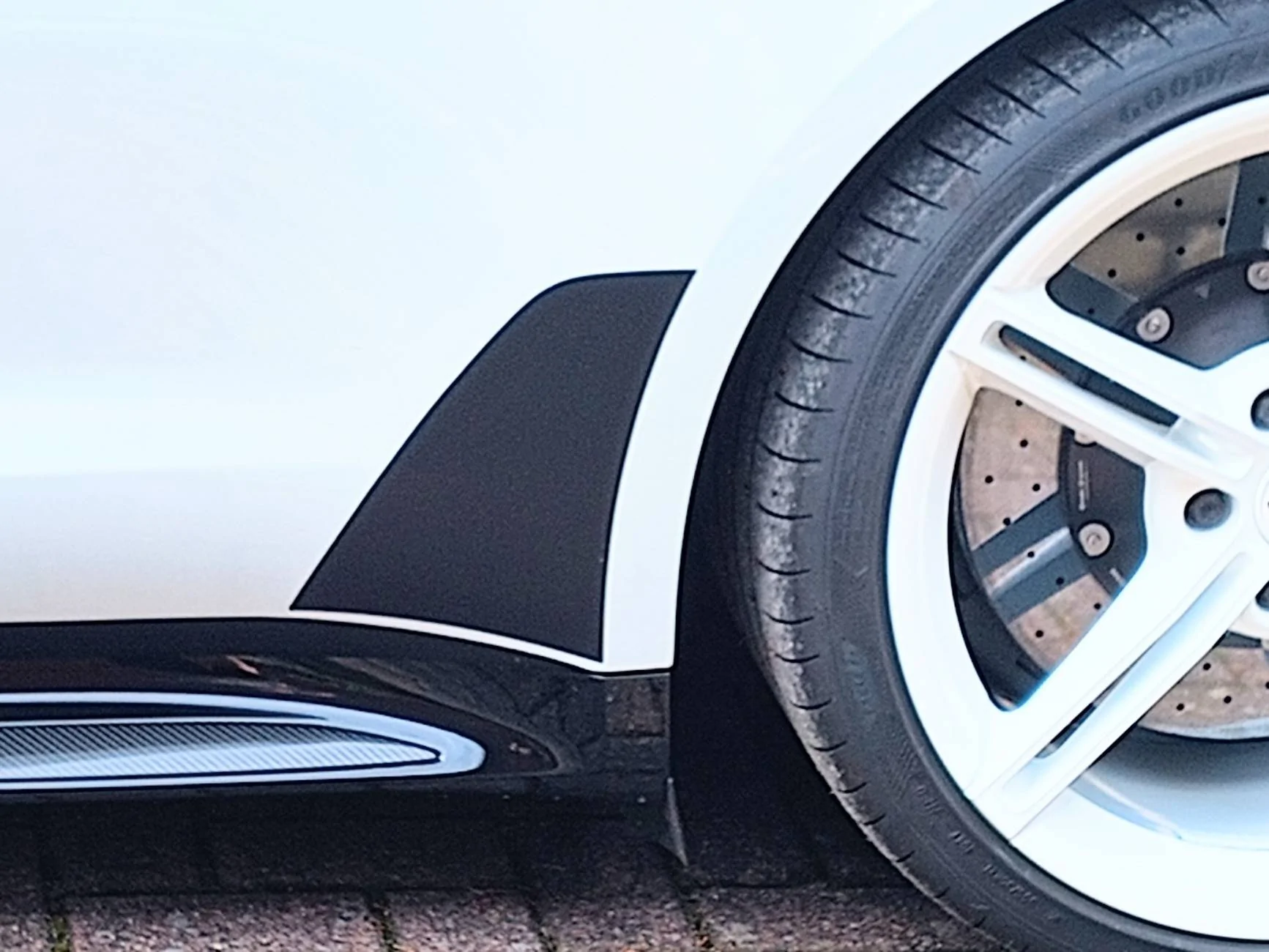 Porsche Taycan I painted my Mission E wheels white. IMG_20240903_125406256