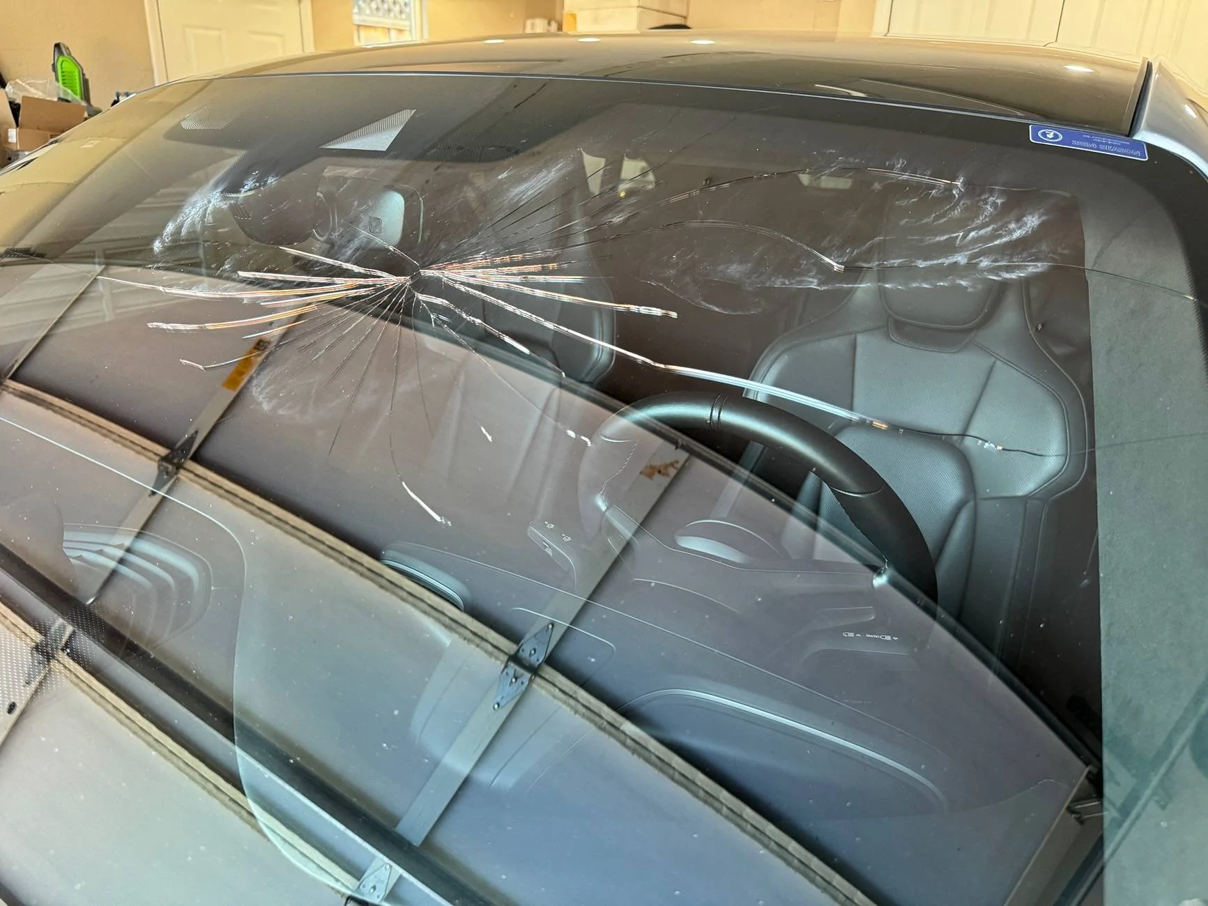 Porsche Taycan Magnetic windshield (onto 3rd replacement windshield) IMG_3172
