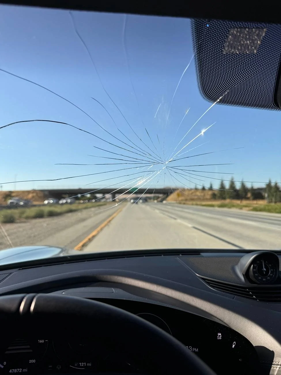 Porsche Taycan Magnetic windshield (onto 3rd replacement windshield) IMG_3171