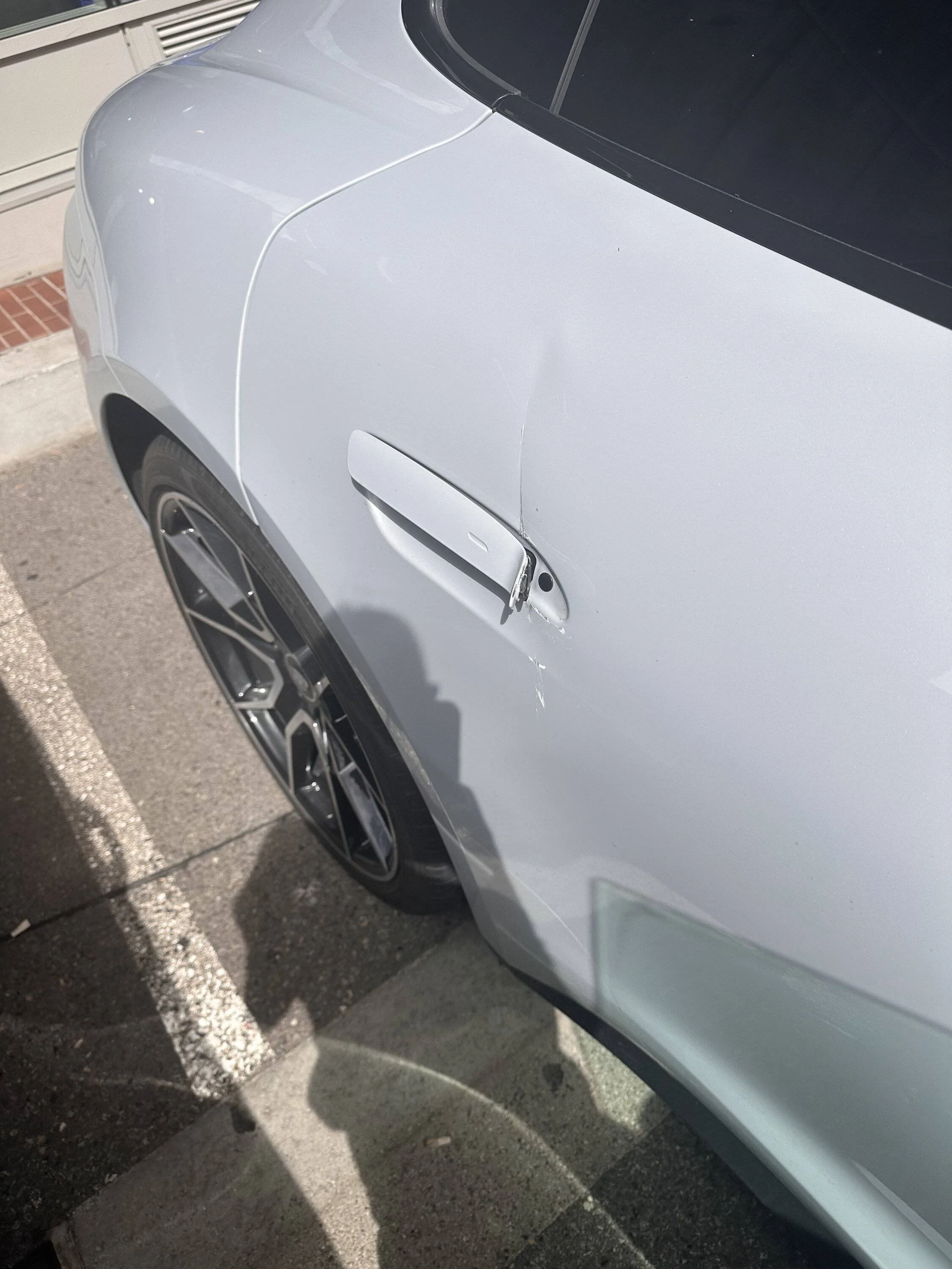 Porsche Taycan Rear door damage IMG_4351