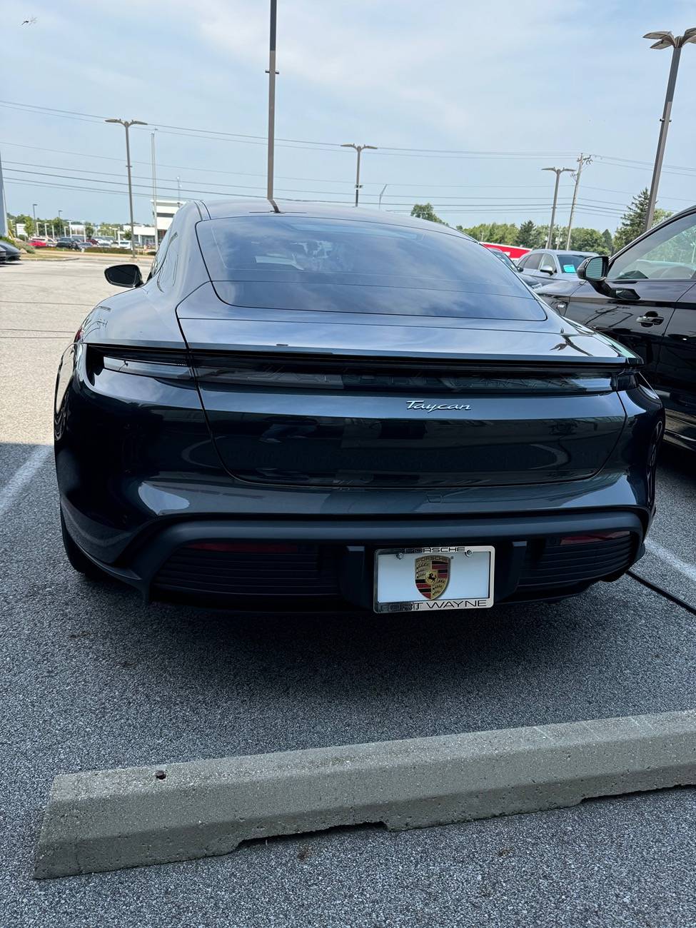Porsche Taycan Rear light strip with 'PORSCHE' logo in black?? IMG_1458
