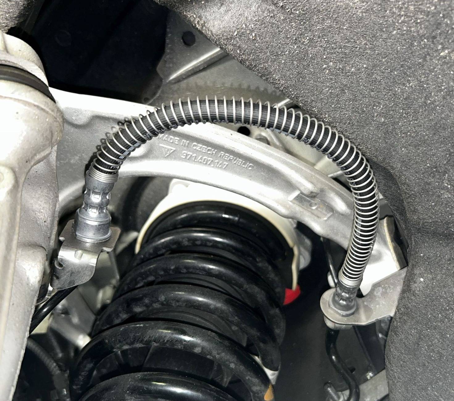 Porsche Taycan got the ARB0 brake hose recall and WPK0 PSM reprogram done left_after