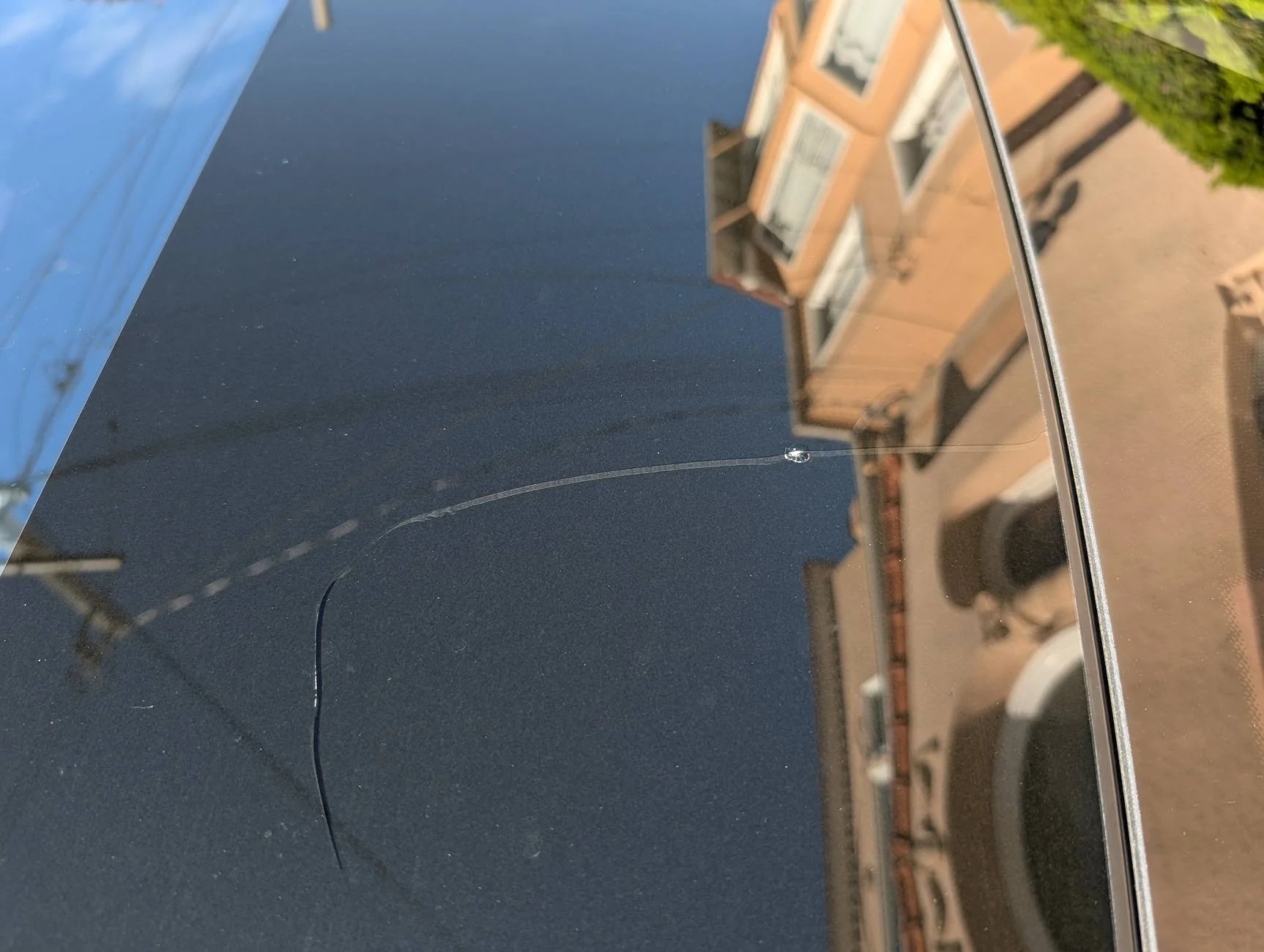 Porsche Taycan Argh! Cracked glass roof! PXL_20241114_213458258
