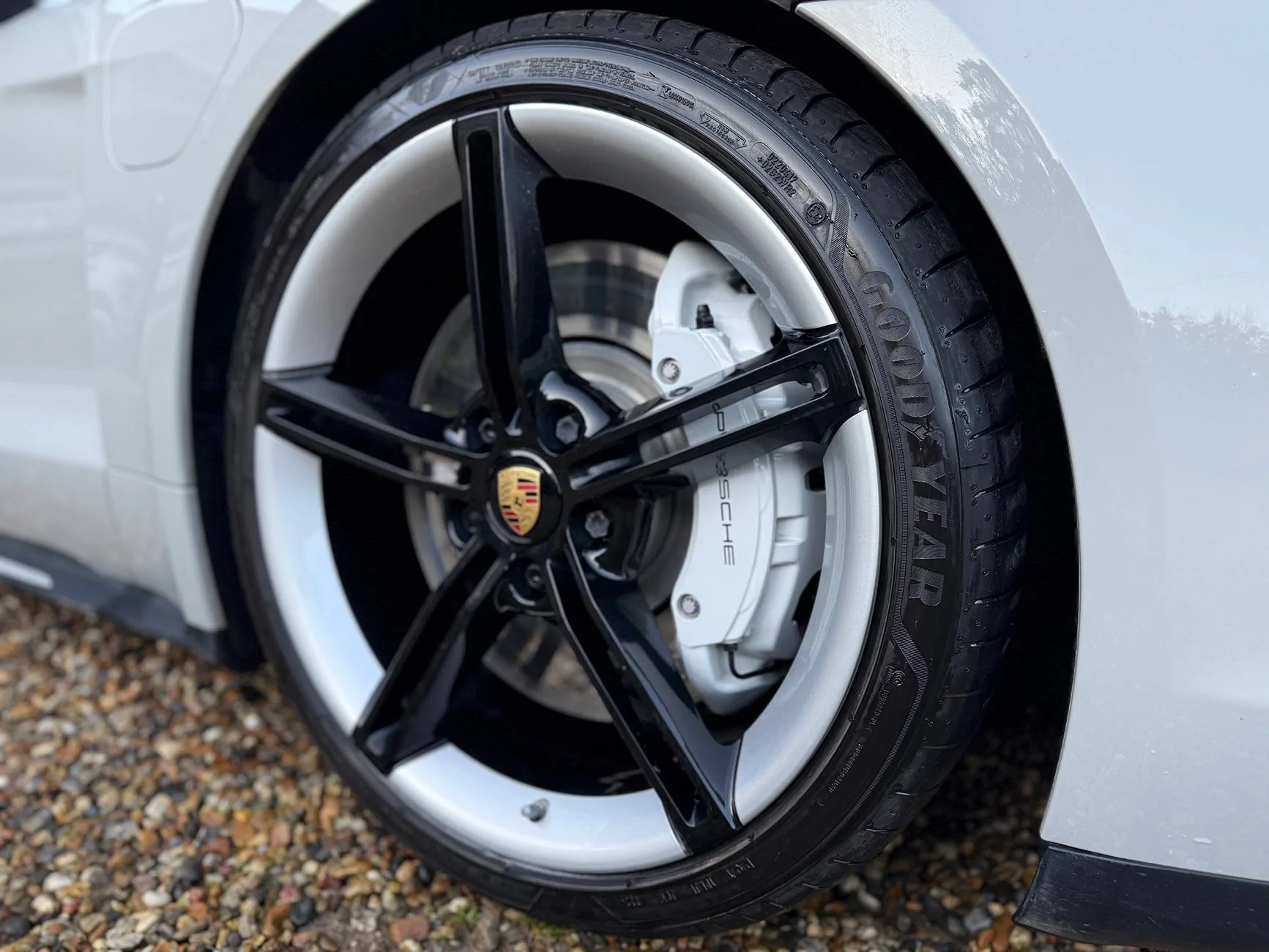 Porsche Taycan All black wheel centres and dust caps. IMG_4279