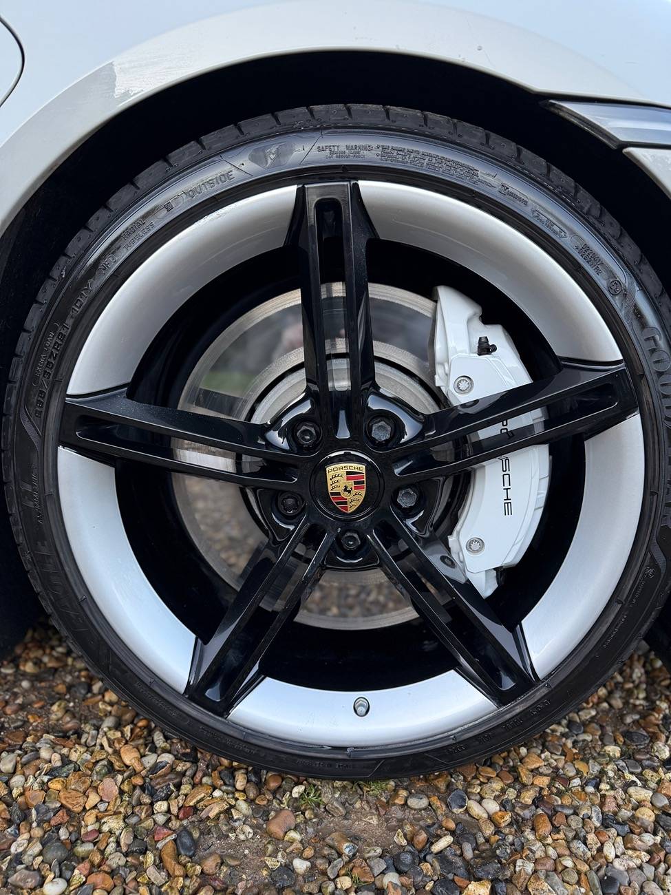 Porsche Taycan All black wheel centres and dust caps. IMG_4278