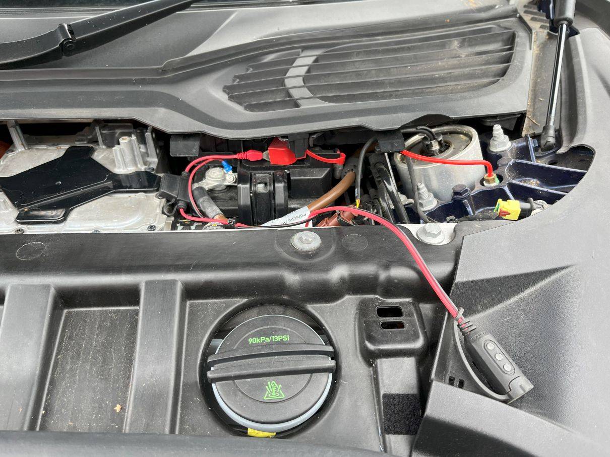 Porsche Taycan 12V drain on leaving car standing. IMG_2025