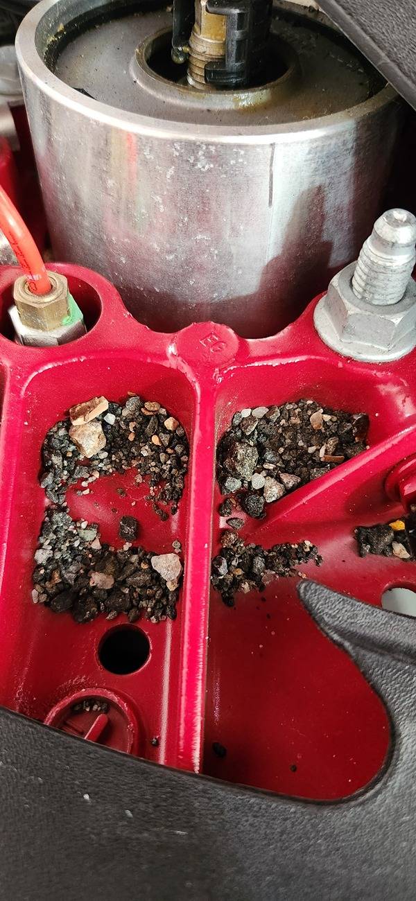 Porsche Taycan Pebbles and road debris under the hood 1000012866