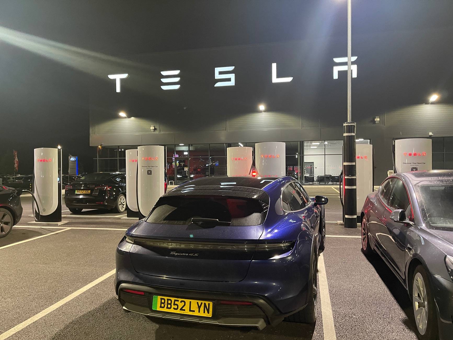 Porsche Taycan Any update to when we will be able to use Tesla network? IMG_1317