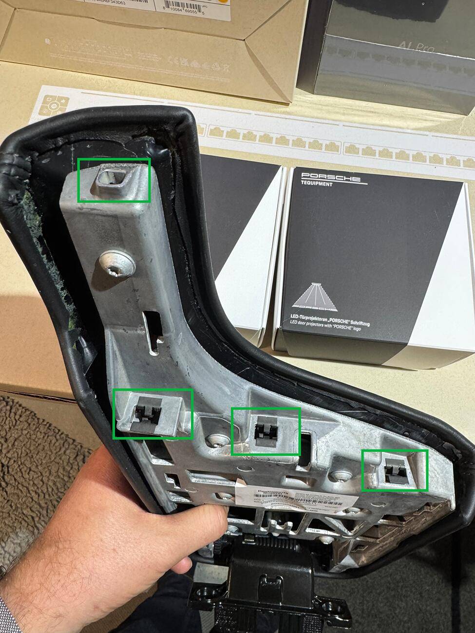 Porsche Taycan Removal of Center Console Arm Rest Lid for a replacement with a crest IMG_5946