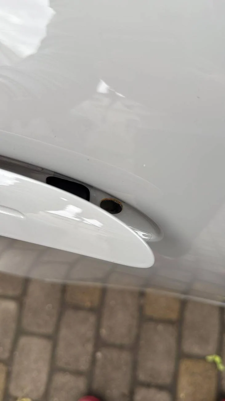 Porsche Taycan Rust under door handles WhatsApp Image 2025-06-09 at 14.39.41