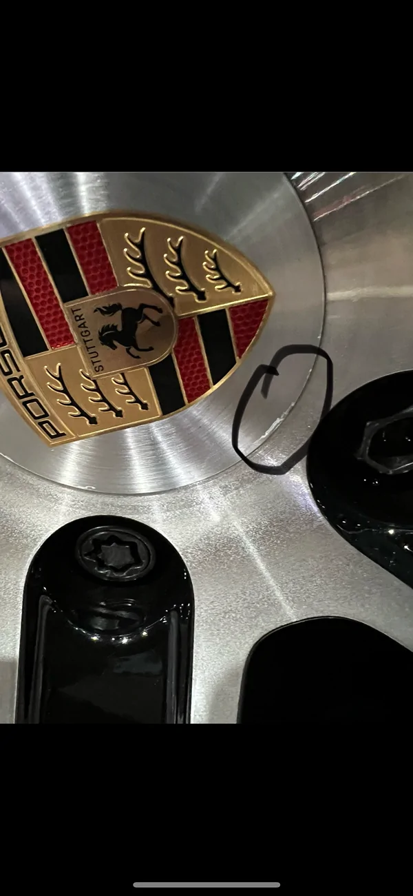 Porsche Taycan Paint chipping/flaking on all 4 wheel centre caps IMG_3151