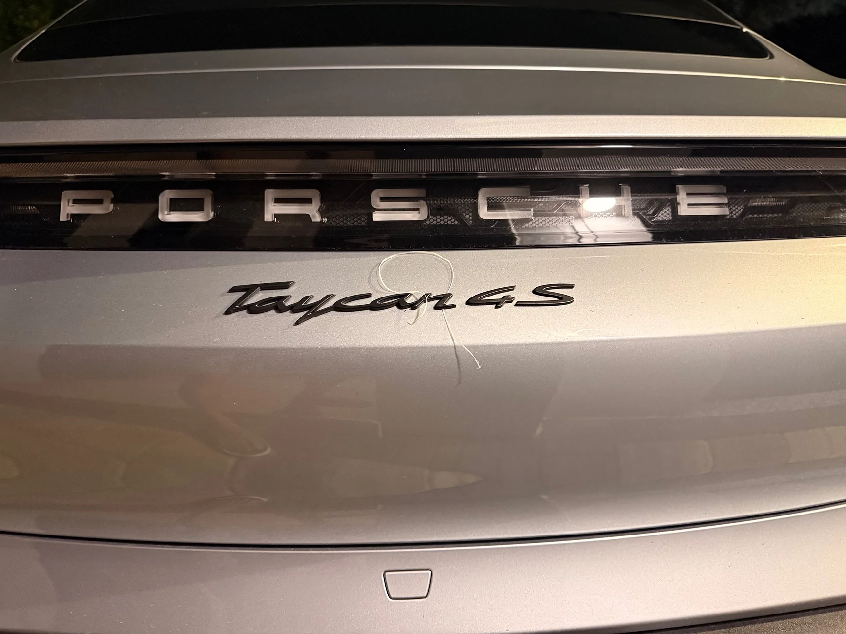 Porsche Taycan Badge or not IMG_5600