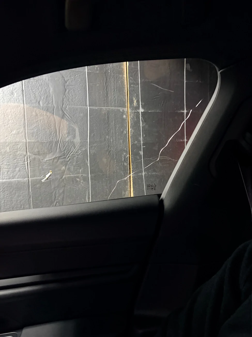 Porsche Taycan Cracked side window -covered under warranty? IMG_0277