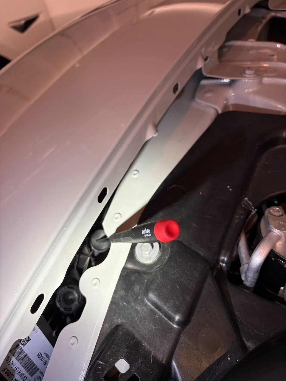 Porsche Taycan DIY headlight up/down adjustment passenger-adj-scr