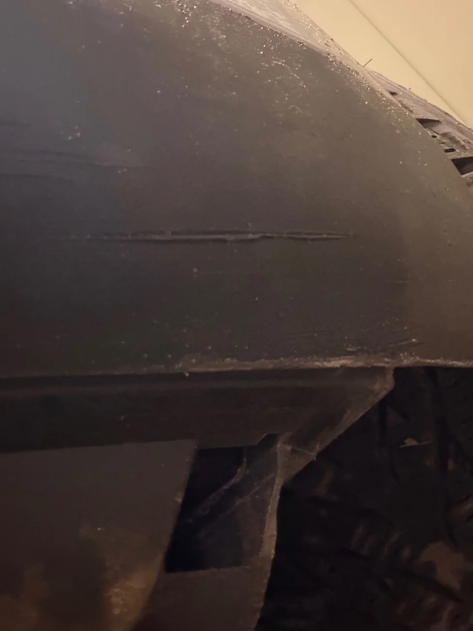 Porsche Taycan Should I fix this scratch under front bumper or leave it? IMG_0889