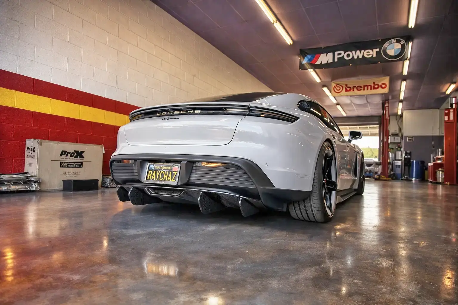 Porsche Taycan Carbon Fiber Diffuser Installed 88936-0c43d7055a1796ba1173e250c0be30a7 copy