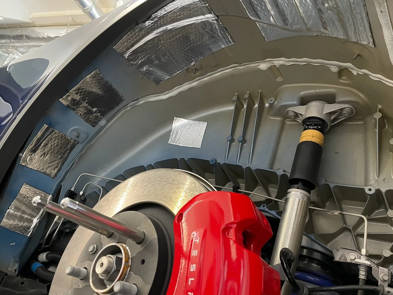 Porsche Taycan Sound Deadening Noise Reduction wheel wells 4