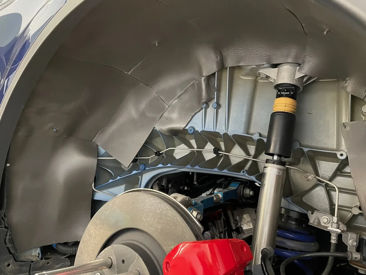Porsche Taycan Sound Deadening Noise Reduction wheel wells 2