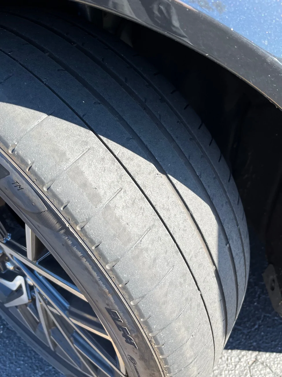 Porsche Taycan Inner tire wear on one wheel after 6 months (sold with new tires) - alignment or issue? IMG_8306