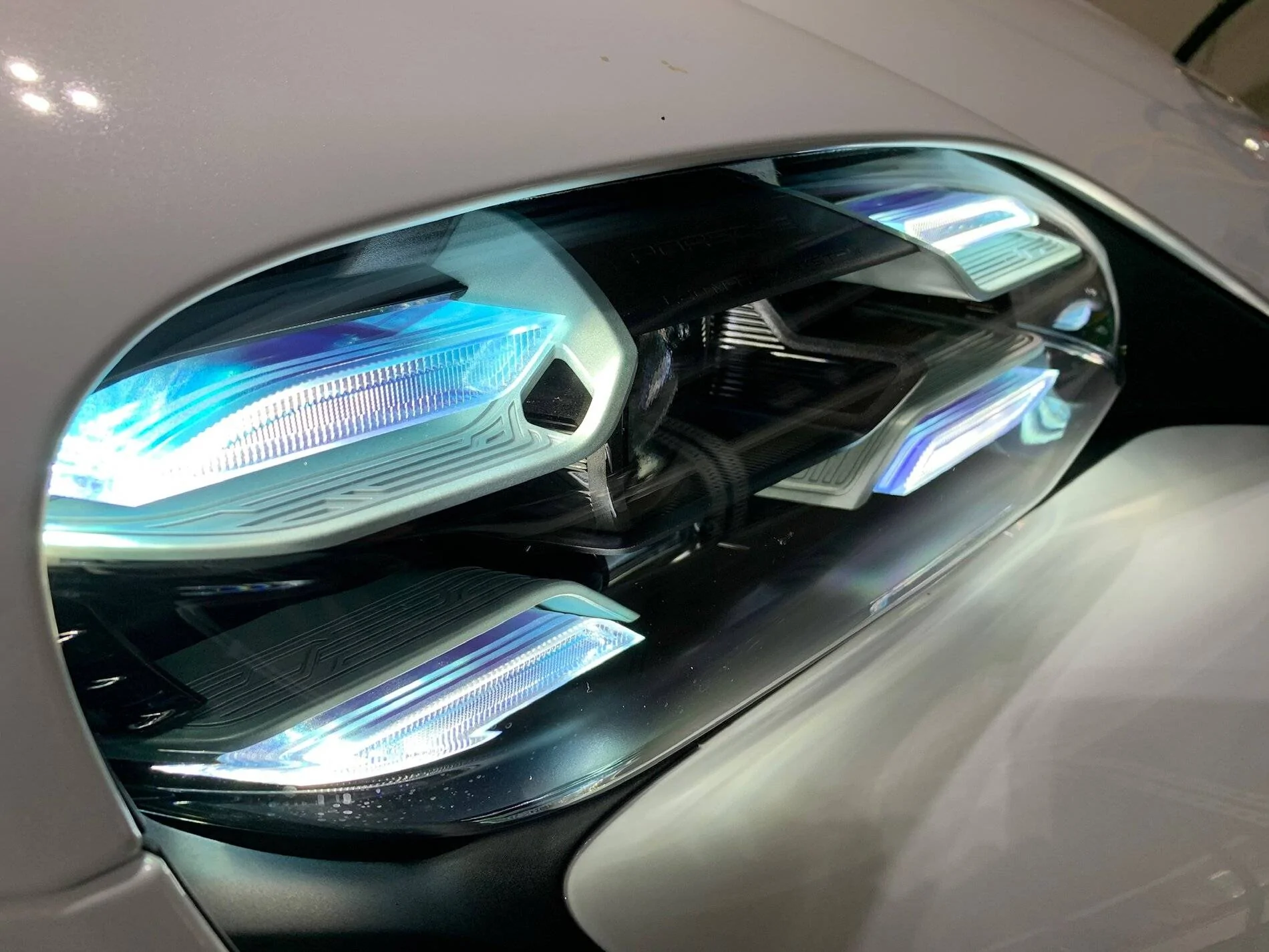 Porsche Taycan Glacier Blue - Decisions DE433208-1F12-44B4-8318-ADFB94CABDB9