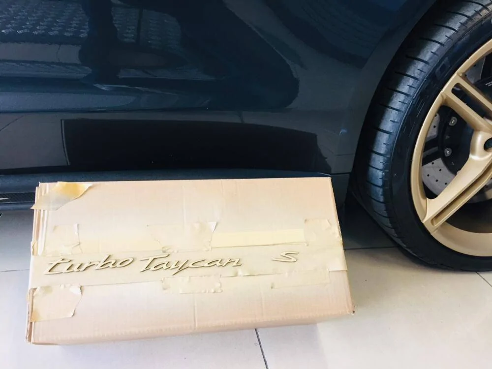 Porsche Taycan Aurum wheels + custom painted Taycan model logo emblem WhatsApp Image 2020-10-21 at 17.27.46