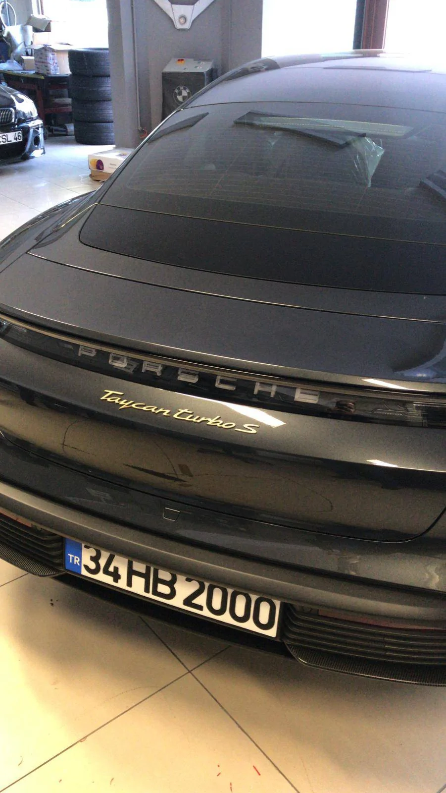 Porsche Taycan Aurum wheels + custom painted Taycan model logo emblem WhatsApp Image 2020-10-22 at 09.21.12