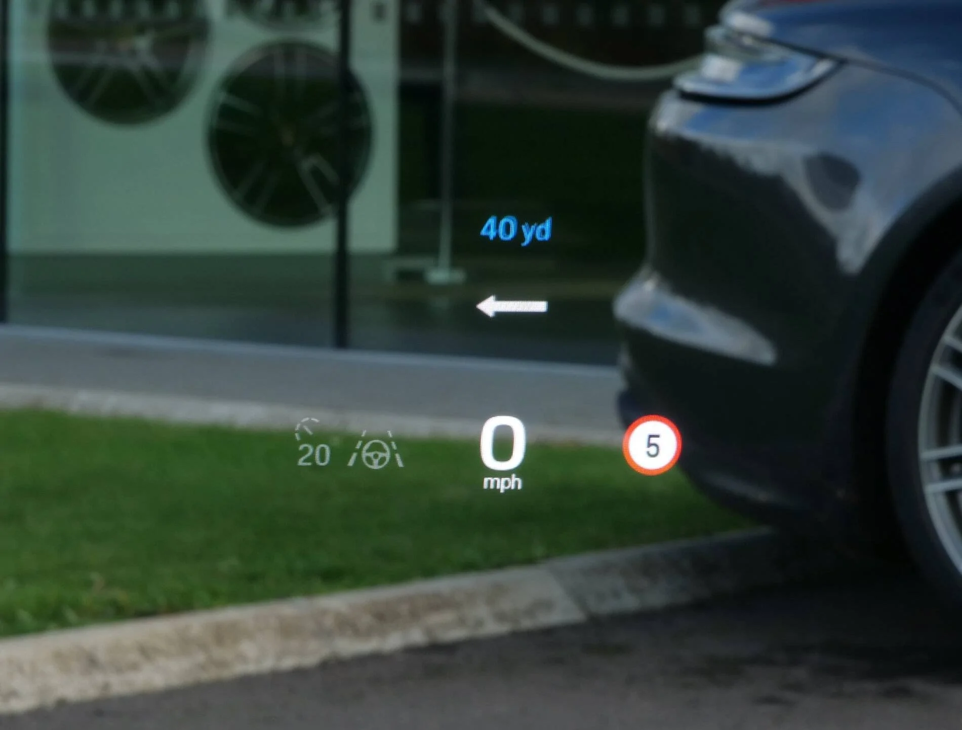 Porsche Taycan Pic of Head Up Display (HUD) & Wireless CarPlay/Charging Heads Up Display