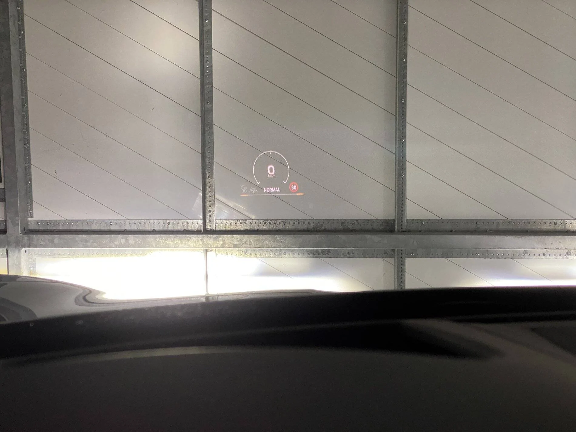 Porsche Taycan Pic of Head Up Display (HUD) & Wireless CarPlay/Charging F1087729-B4AA-4A36-8425-A8193D78F048