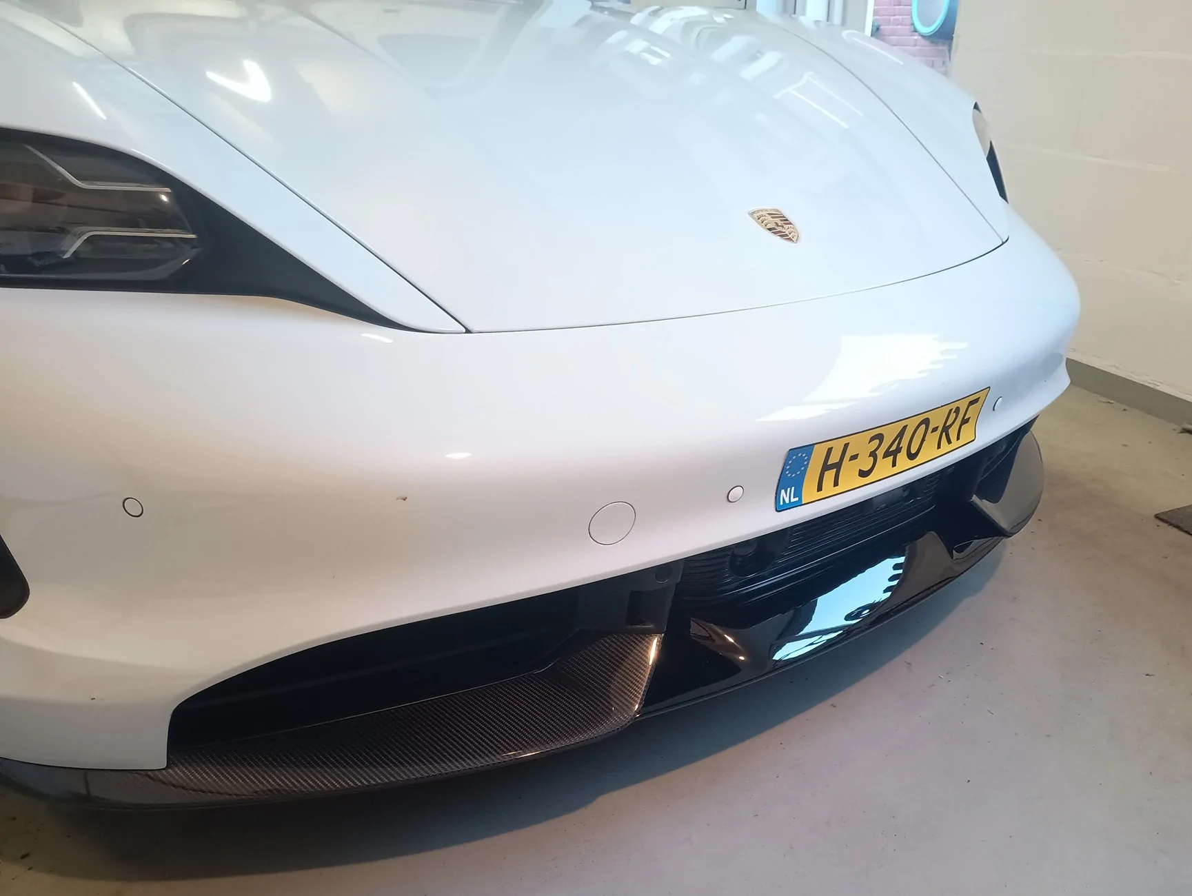 Porsche Taycan Looking for ideas/methods for smoothing surface of unpainted front lower lip spoiler for PPF application IMG_20260421_202923606