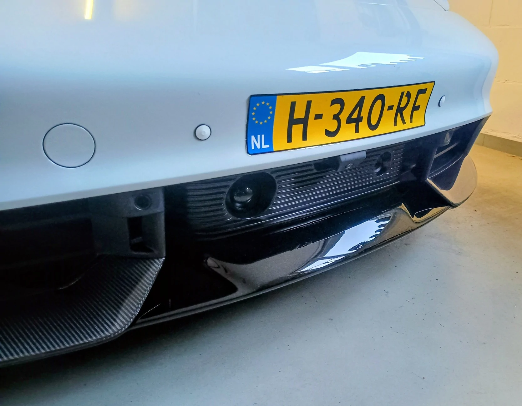 Porsche Taycan Looking for ideas/methods for smoothing surface of unpainted front lower lip spoiler for PPF application IMG_20260421_202901538_HDR~2