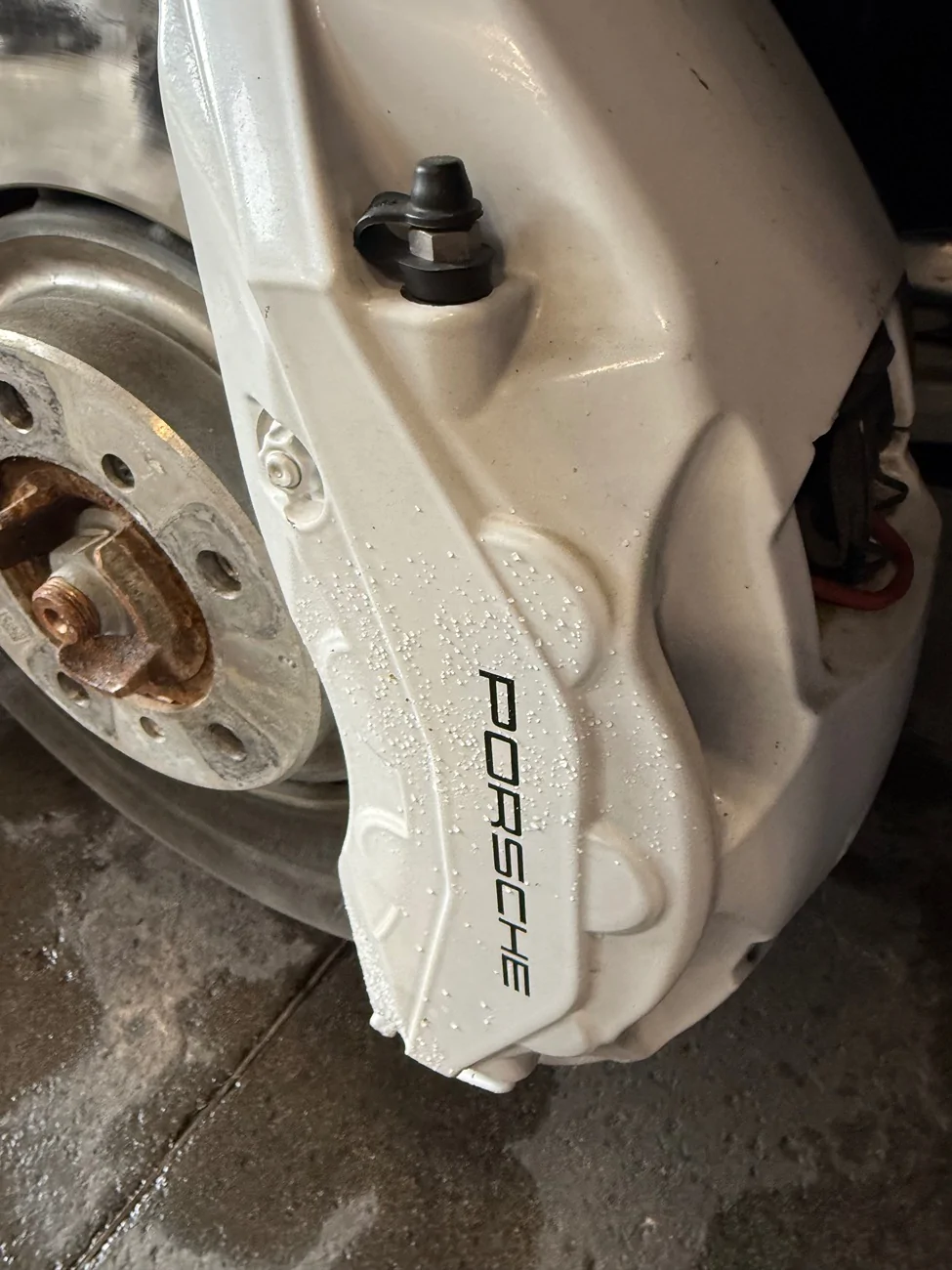 Porsche Taycan Crack on brake calipers IMG_2368