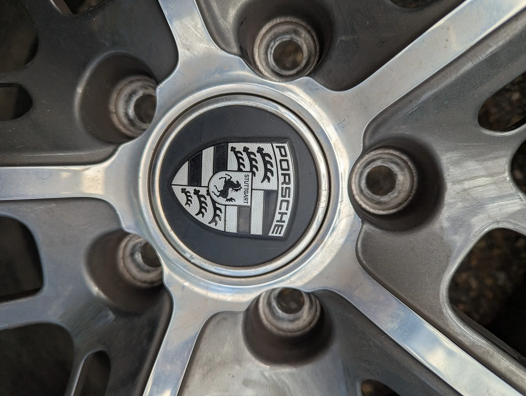Porsche Taycan FOR SALE: OEM 21" Porsche Taycan Wheels Take offs (OC6 Titanium Dark) — Set of 4 | Denver, CO PXL_20260509_214039690