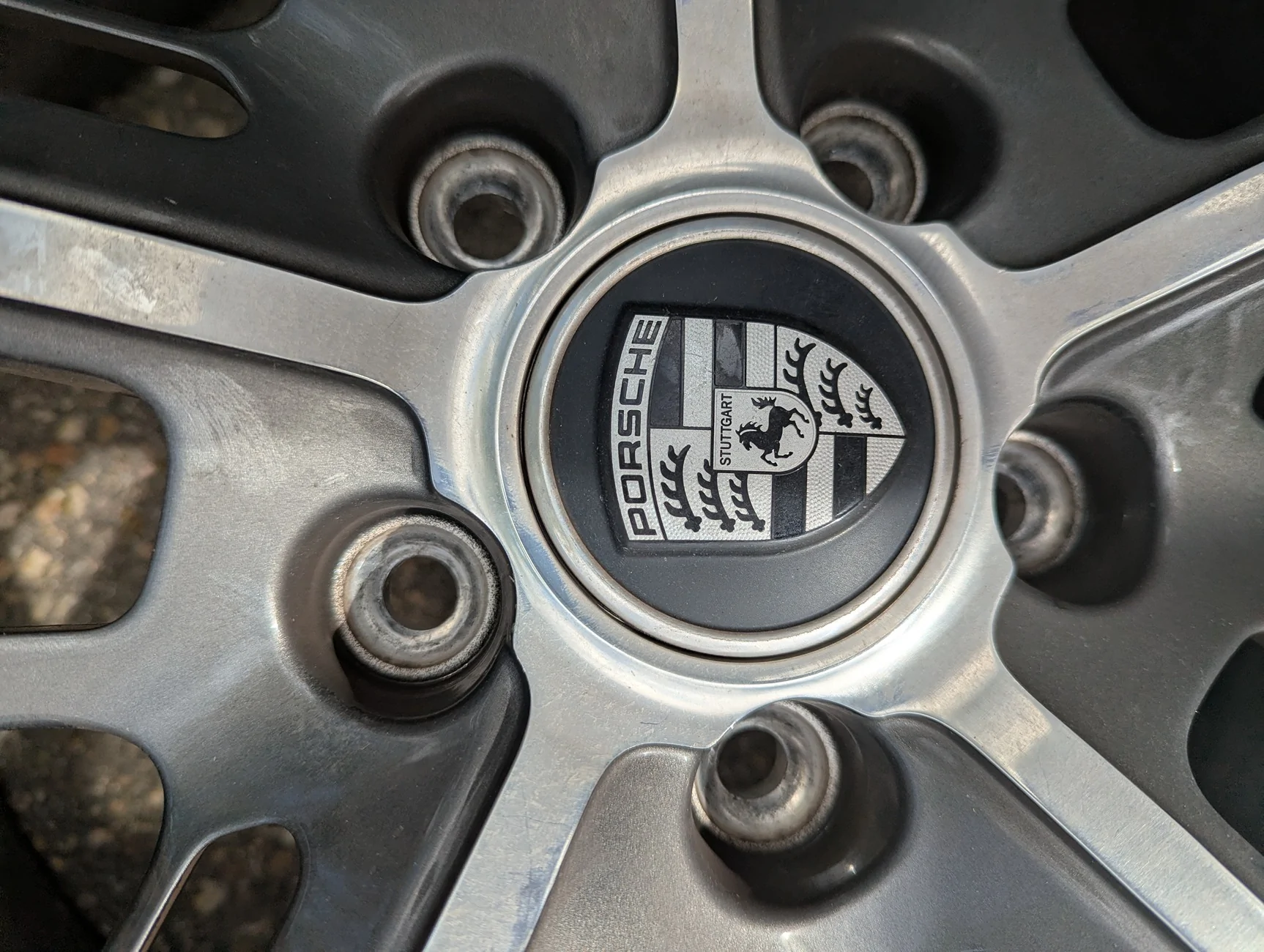 Porsche Taycan FOR SALE: OEM 21" Porsche Taycan Wheels Take offs (OC6 Titanium Dark) — Set of 4 | Denver, CO PXL_20260509_214141711