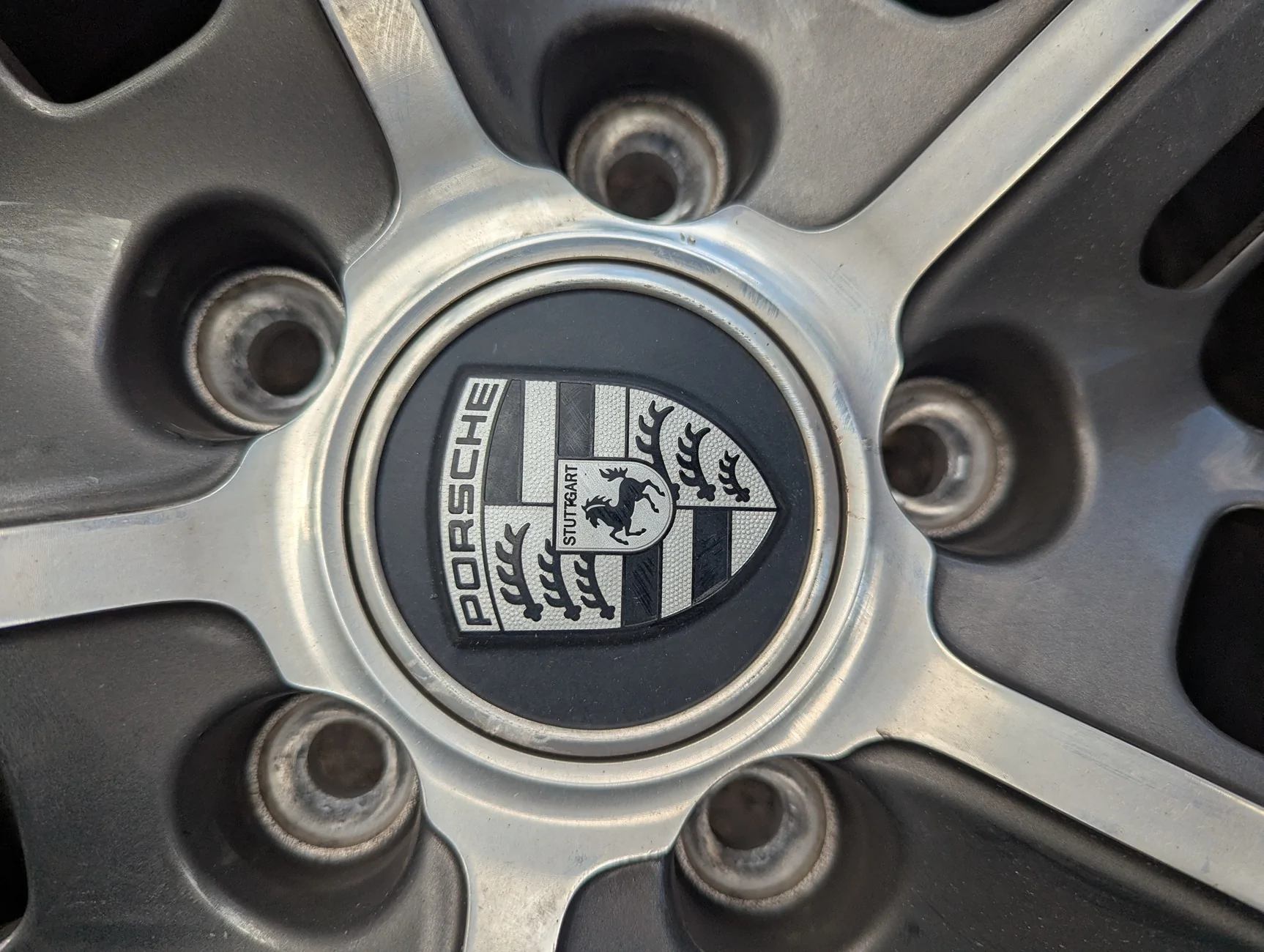 Porsche Taycan FOR SALE: OEM 21" Porsche Taycan Wheels Take offs (OC6 Titanium Dark) — Set of 4 | Denver, CO PXL_20260509_214431584