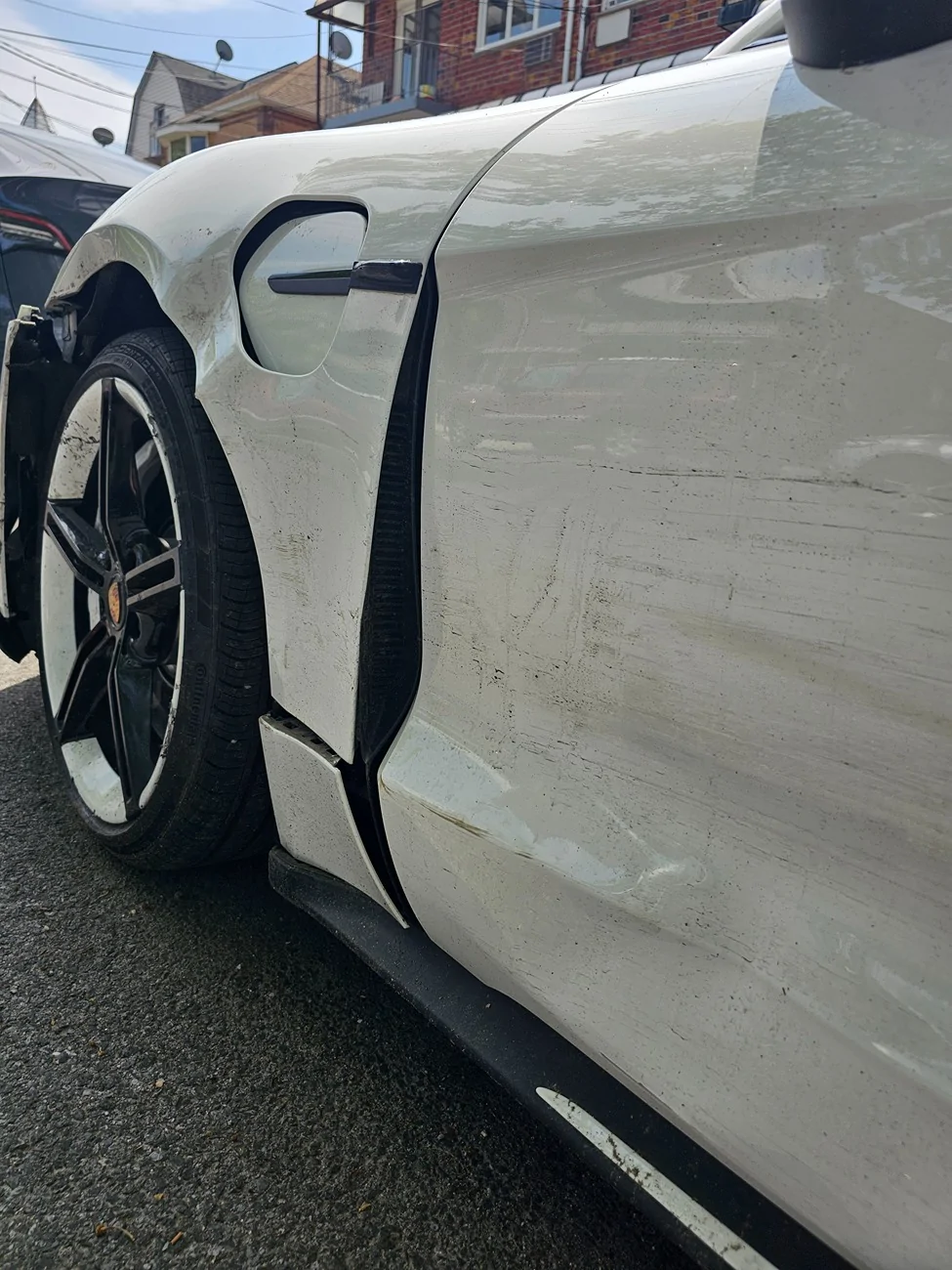 Porsche Taycan Possible total loss? 1000051122