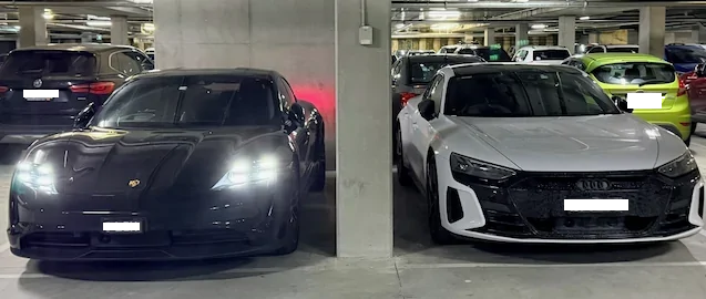 Porsche Taycan Parked next to a brother from a different mother... 1779327439227-rl