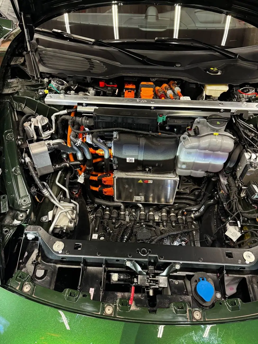 Porsche Taycan Fun fact: 22kw (19.2kW in N.A.) OBC is physically larger than the 11kW (9.6kW in N.A. after OTA downgrade) 1786270600968-8t