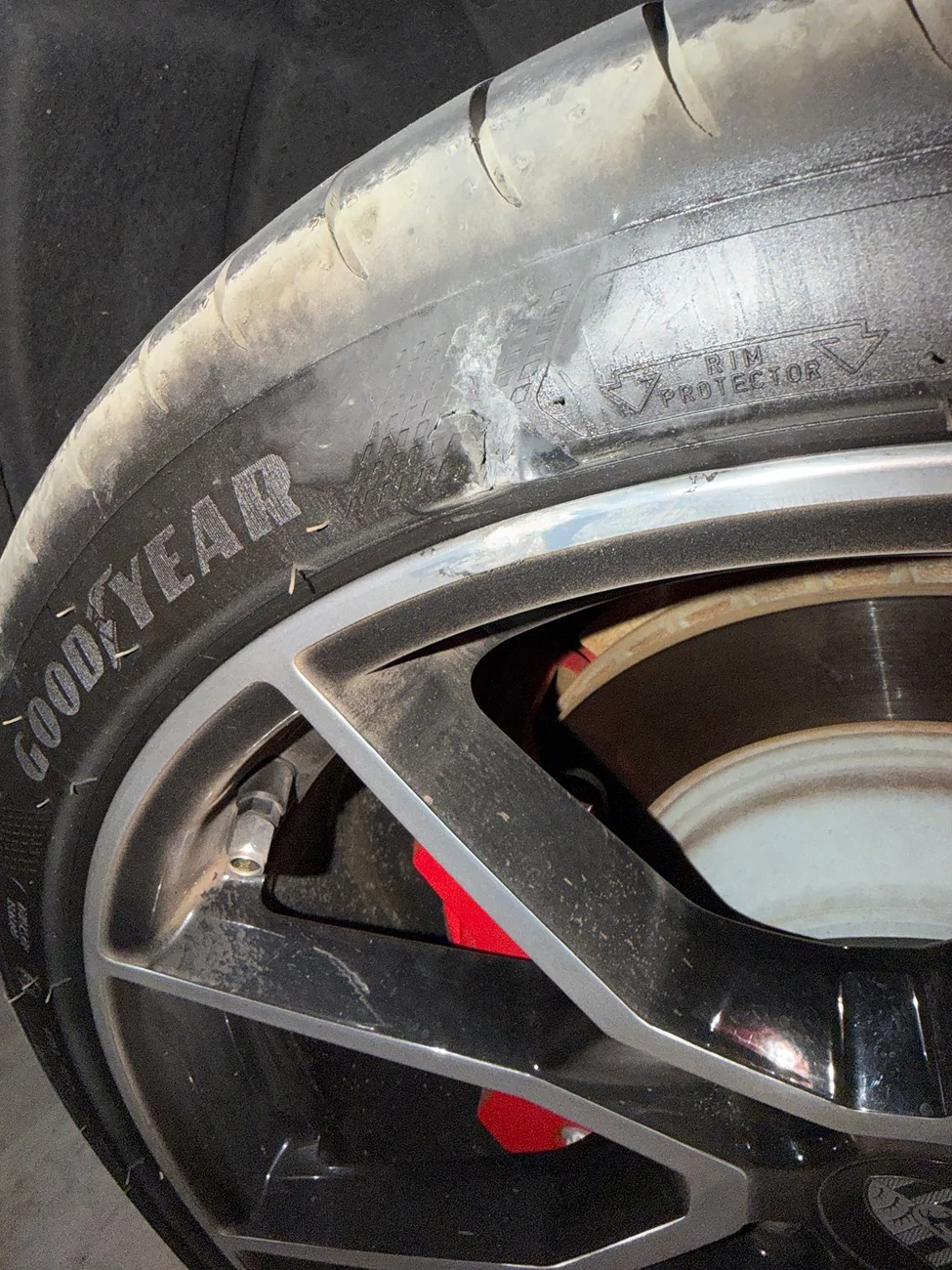 Porsche Taycan Hit A Curb IMG_0963
