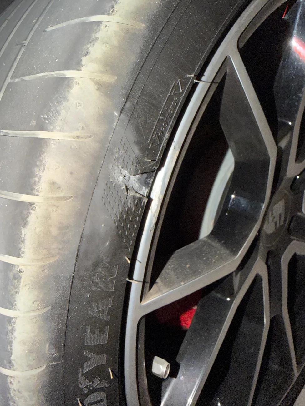 Porsche Taycan Hit A Curb IMG_0961