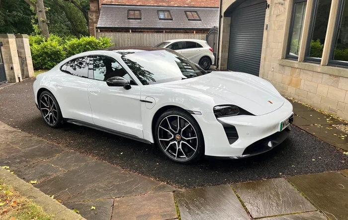 A review of the first two weeks of ownership, including Belgium run in Taycan Turbo S